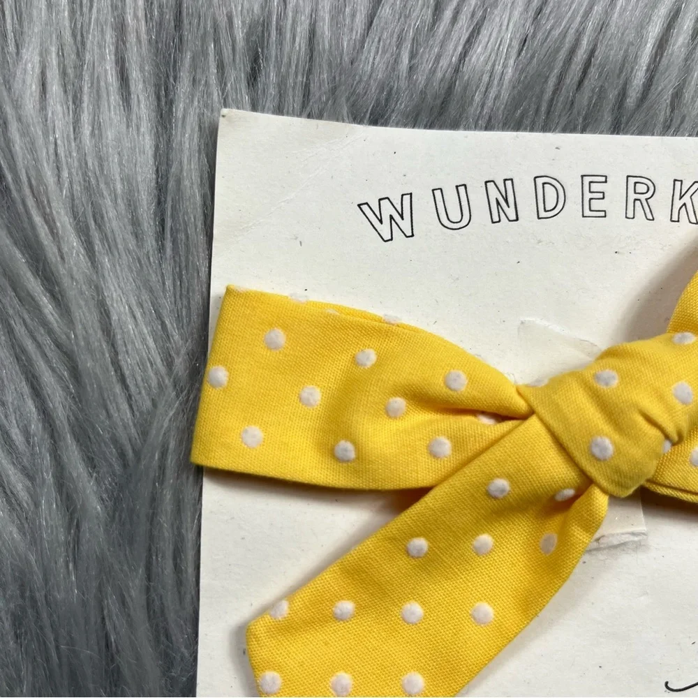 Wunderkin yellow Swiss dot bow clip